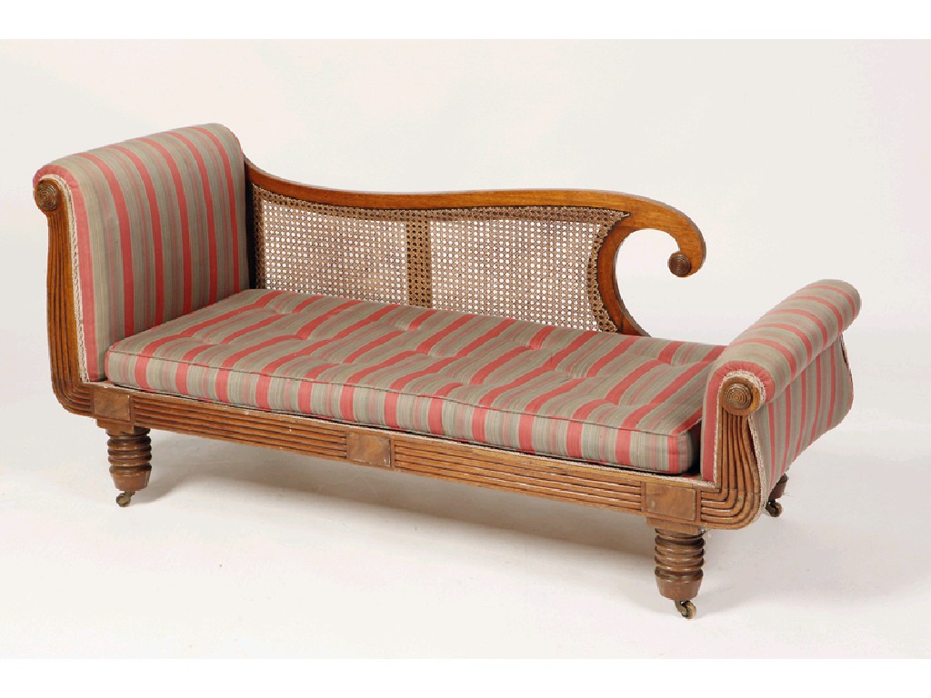 Appraisal: A REGENCY WALNUT FRAMED CHAISE LONGUE with upholstered seat and