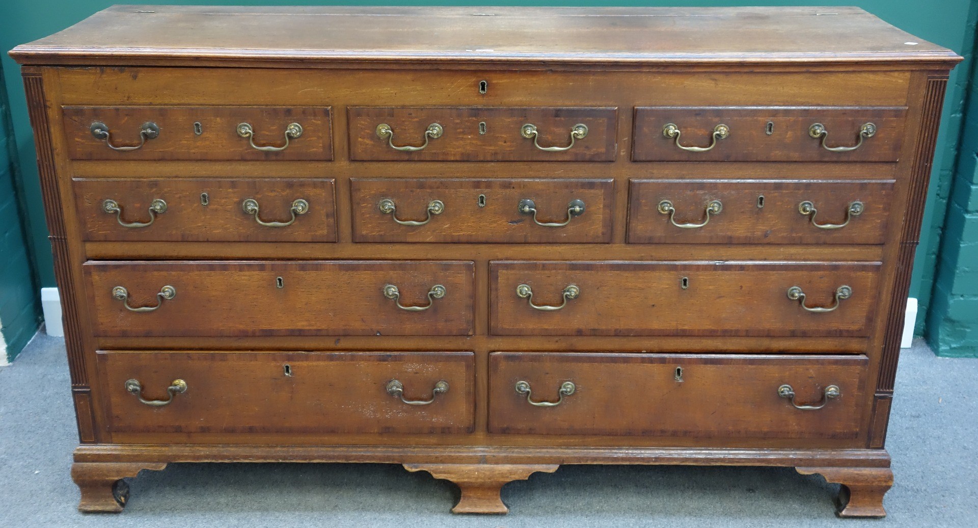 Appraisal: A mid th century mahogany banded oak mule chest the