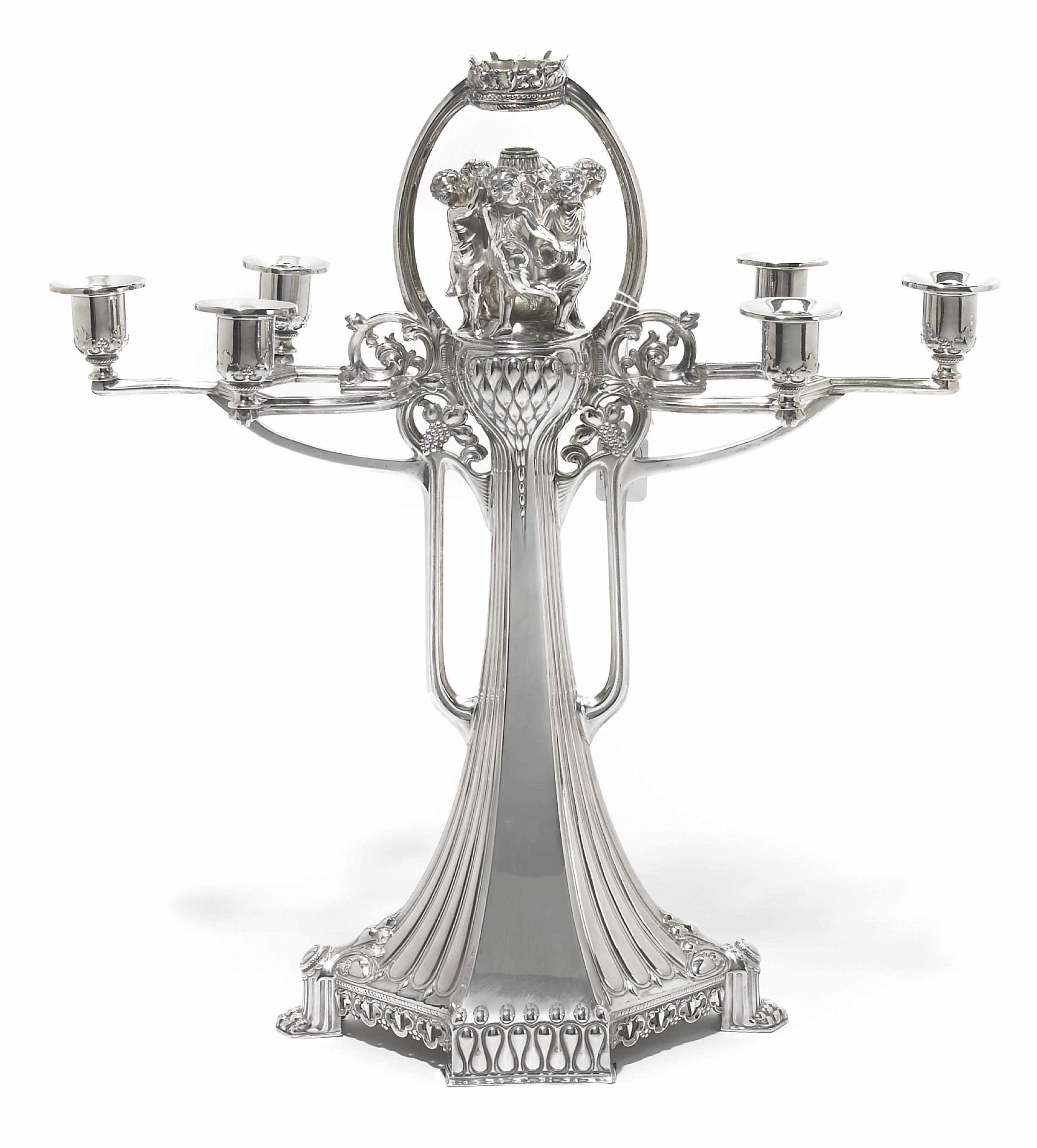 Appraisal: A German Jugendstil silverplate six-light centerpiece candelabrum WMF Geislingen circa