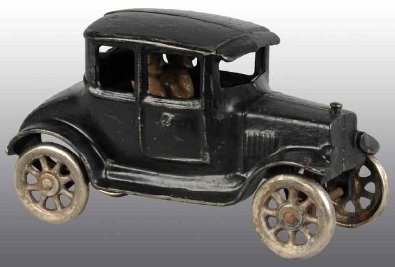 Appraisal: Cast Iron Kilgore Coupe Automobile Toy Description American Embossed Kilgore