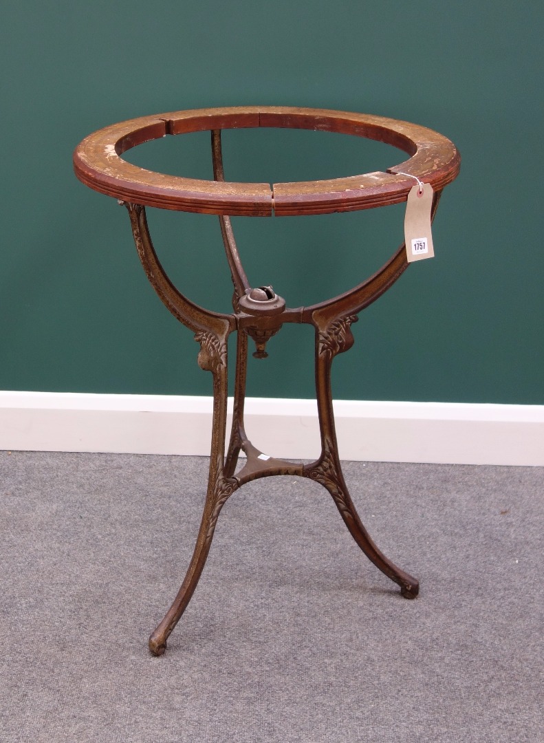 Appraisal: A late Victorian globe stand with paper meridian ring on