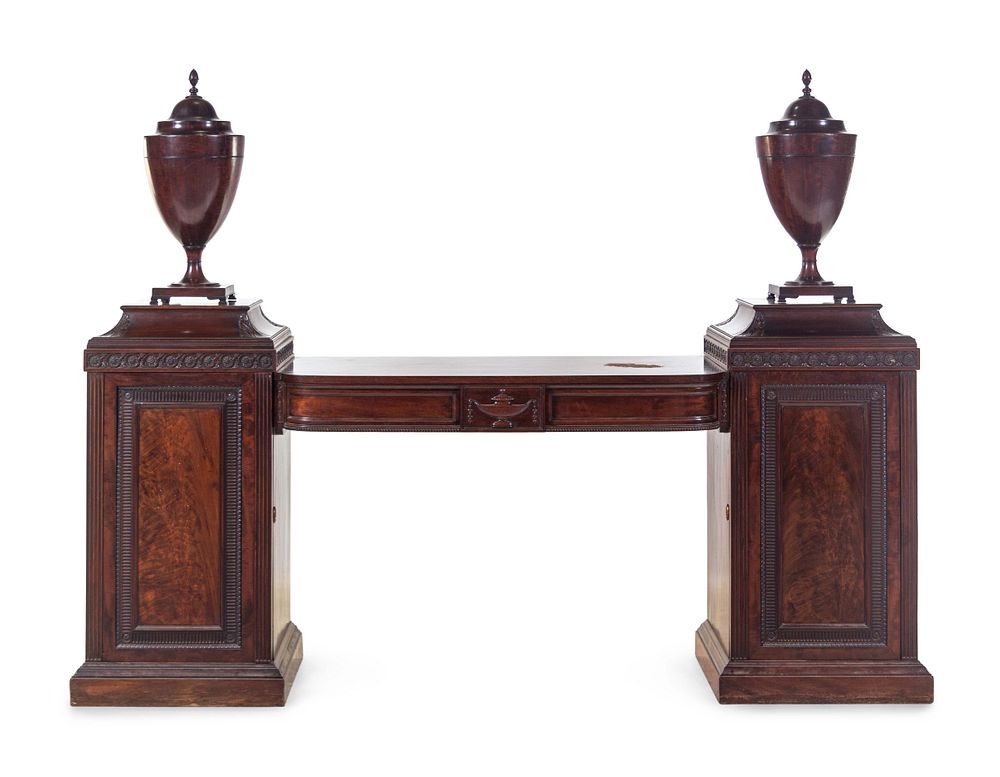 Appraisal: A George III Carved and Figured Mahogany Double Pedestal Sideboard