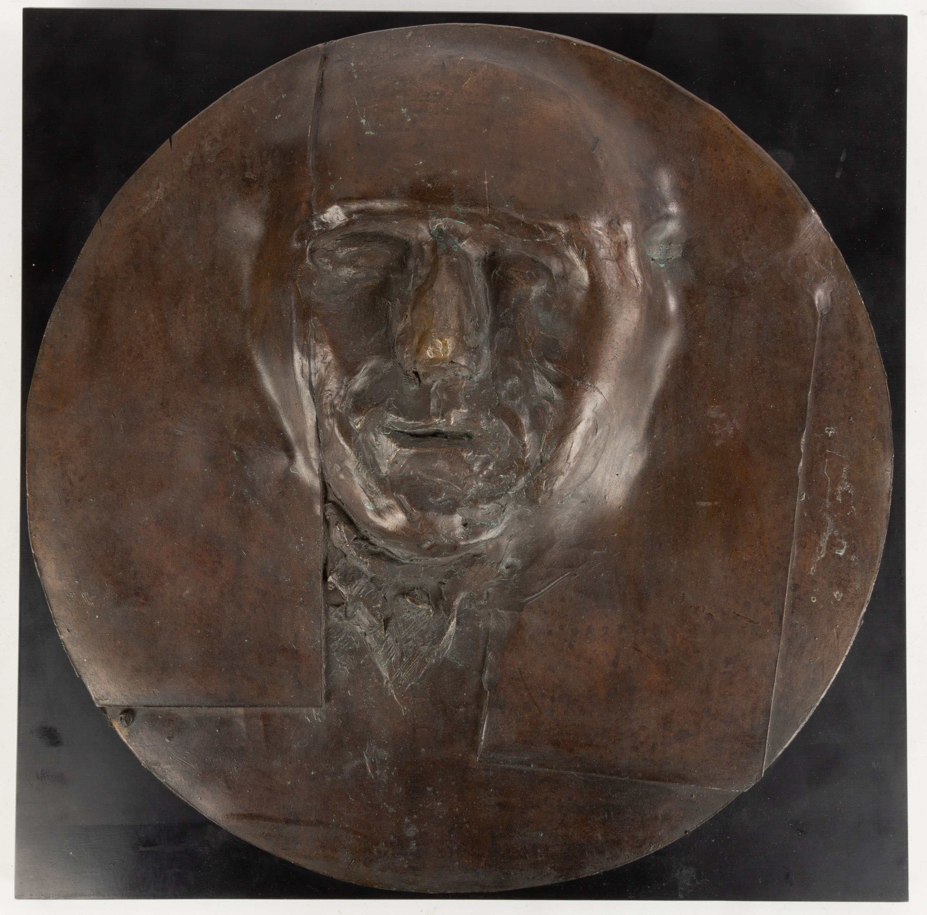 Appraisal: LEONARD BASKIN AMERICAN - BRONZE PLAQUE Patinaed bronze mounted on