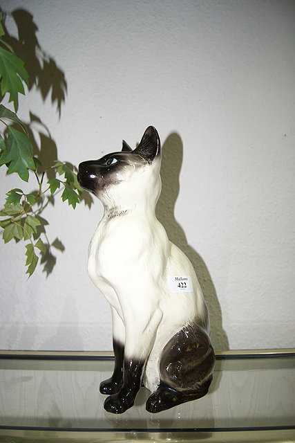 Appraisal: A BESWICK PORCELAIN MODEL A fireside suited to Cat No