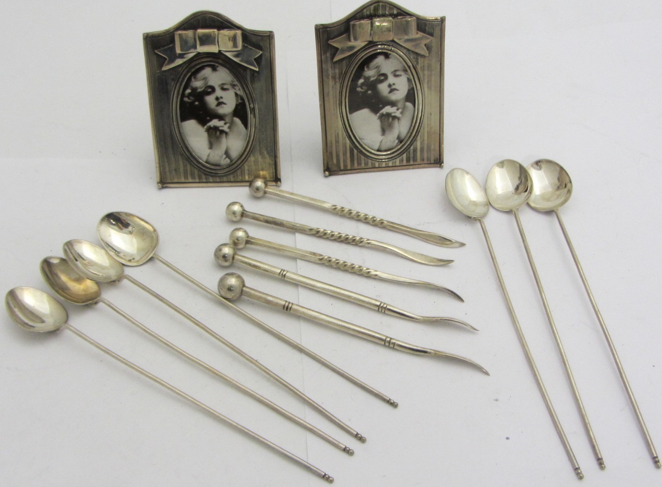 Appraisal: Seven plated small coffee spoons with long handles five plated