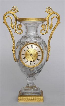 Appraisal: CHARLES X GILT-BRONZE MOUNTED CUT-GLASS CLOCK The in silvered metal