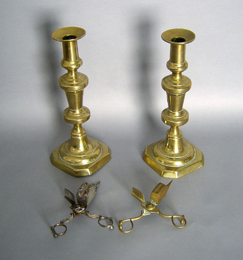 Appraisal: Pair of brass candlesticks th c h together with snuffers