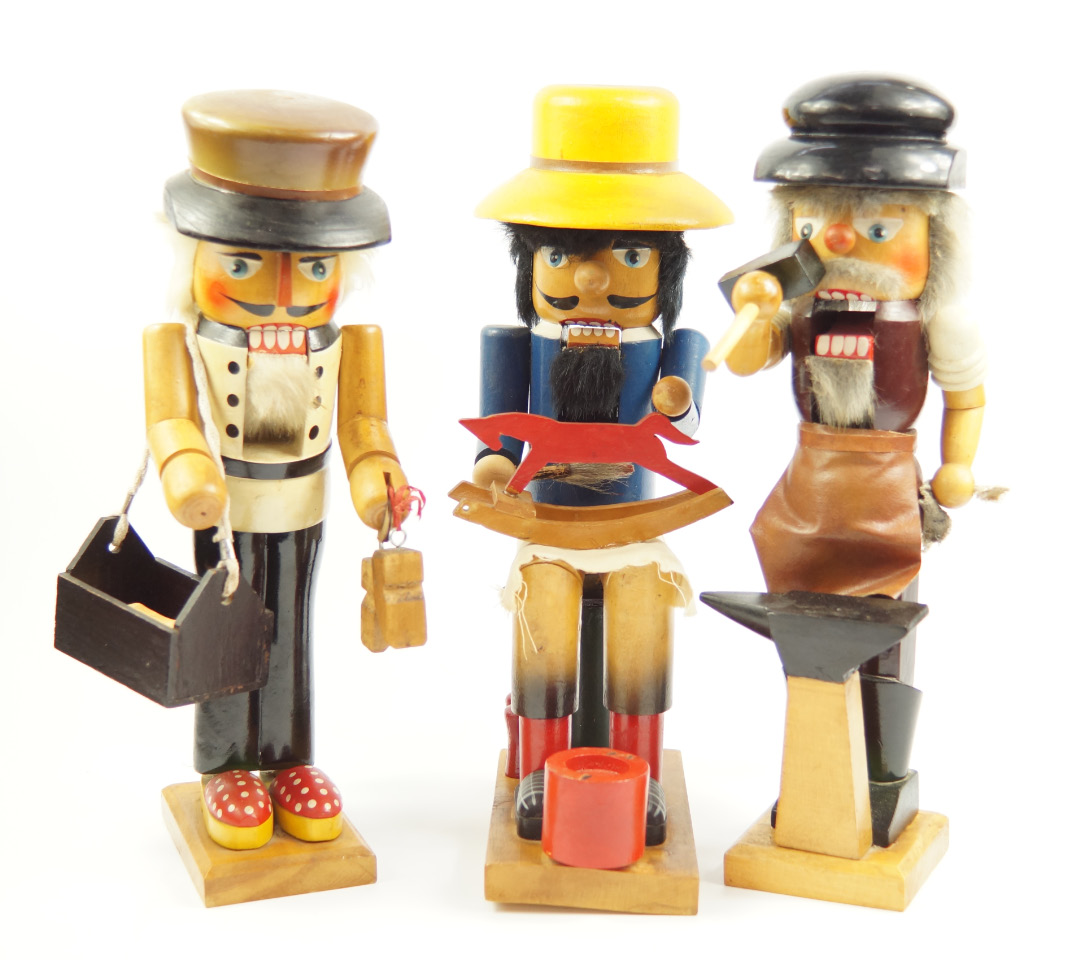 Appraisal: Three German wooden figural novelty nut crackers mid th Century