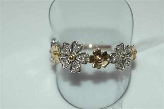 Appraisal: A DIAMOND FLORAL RING STAMPED CT GOLD