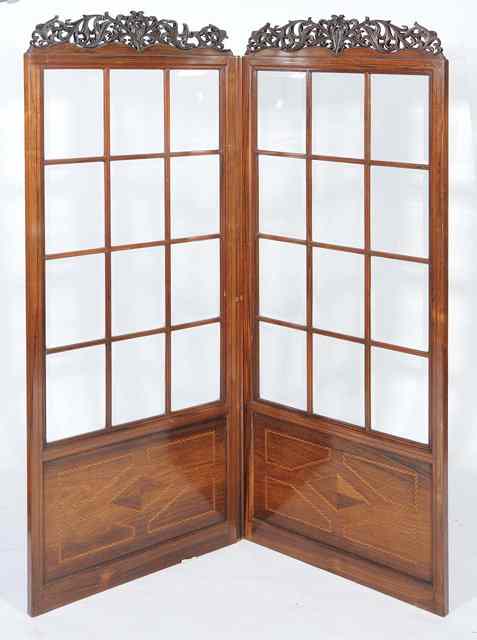 Appraisal: A LATE VICTORIAN ROSEWOOD TWO FOLD SCREEN with pierced scrolling