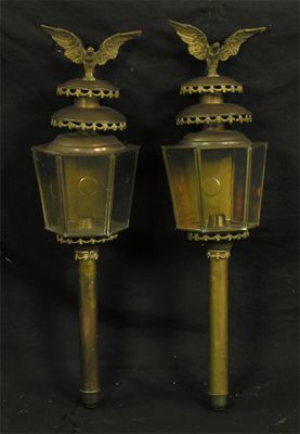 Appraisal: A pair of gilt brass carriage lamps having eagle surmounts