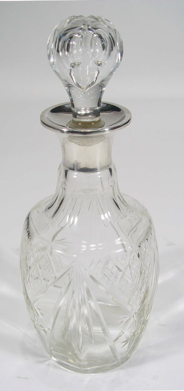 Appraisal: Cut glass decanter and stopper with silver collar Sheffield cm