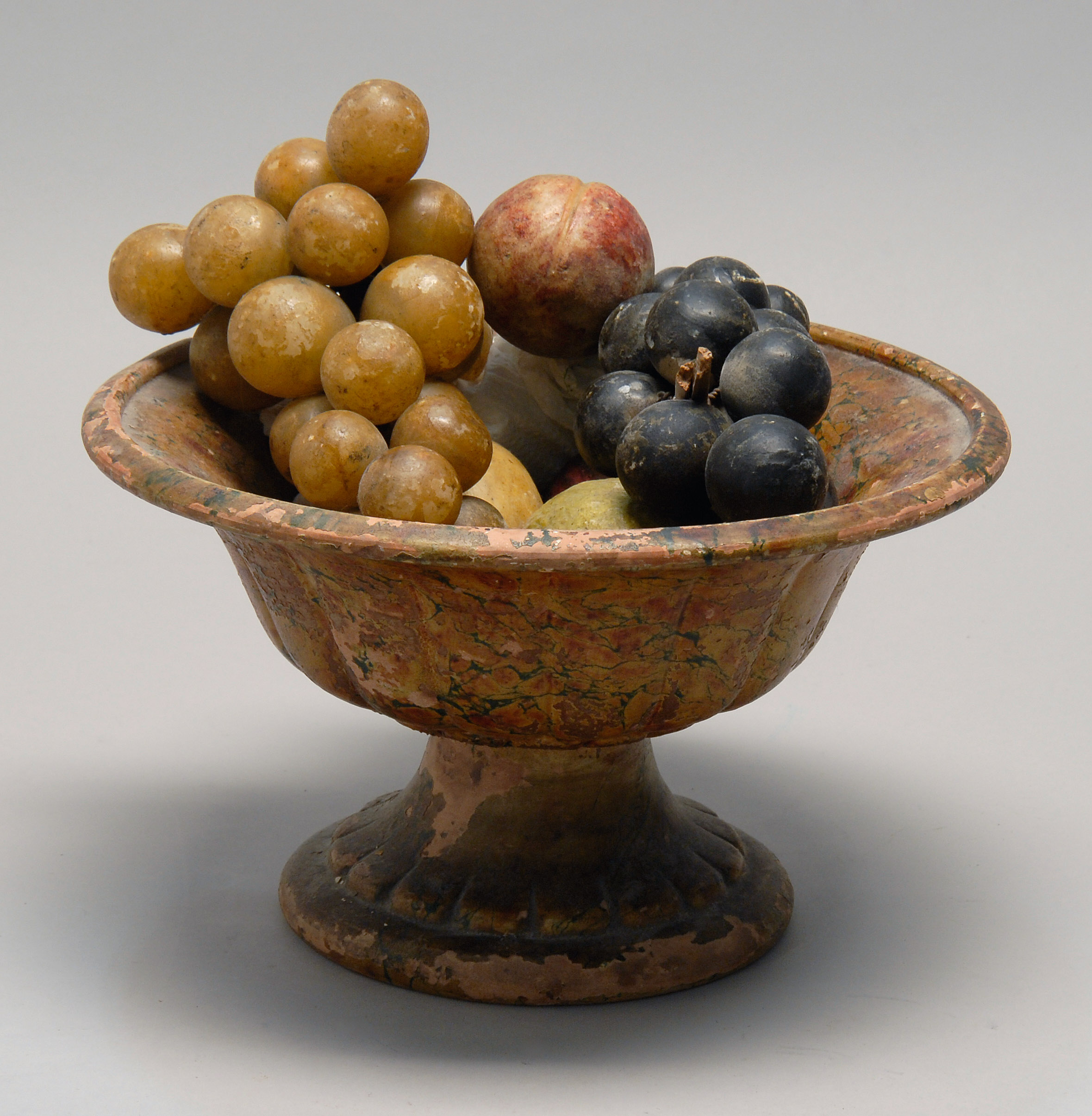 Appraisal: TH CENTURY EARTHENWARE COMPOTE in yellow green and red paint