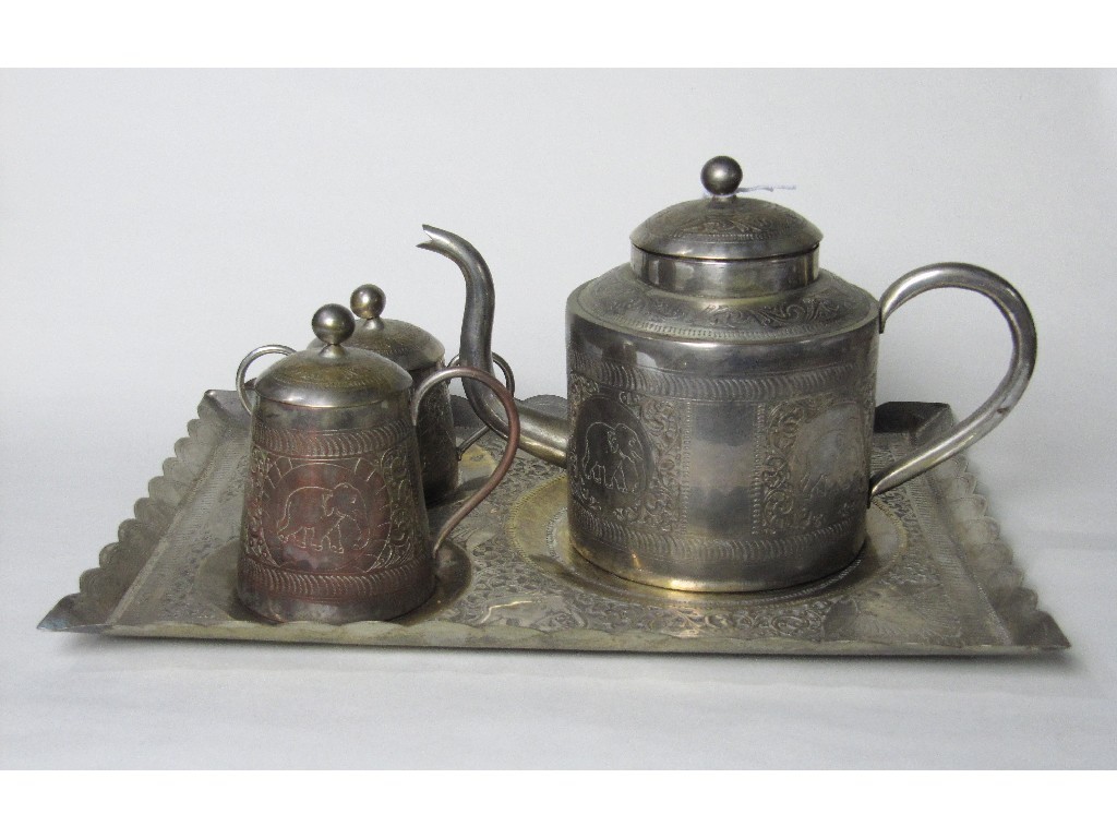 Appraisal: Indian white metal three piece tea service on tray