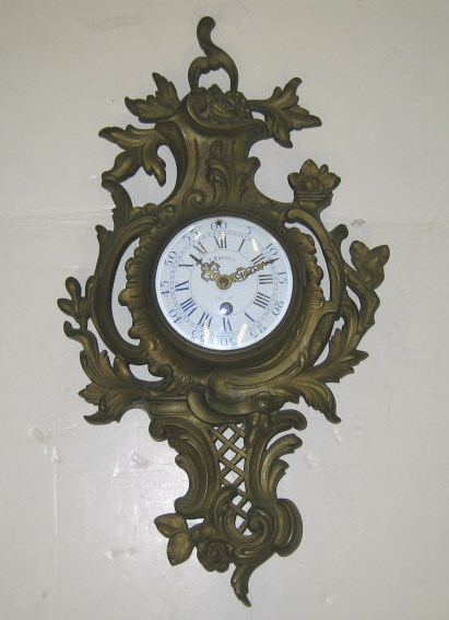 Appraisal: FRENCH LOUIS XV STYLE CARTEL WALL CLOCK Cast ormolu case