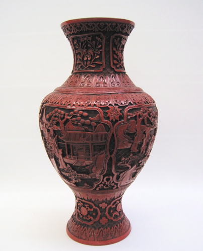 Appraisal: CHINESE CINNABAR CARVED LACQUER VASE decorated with blossoms and figures