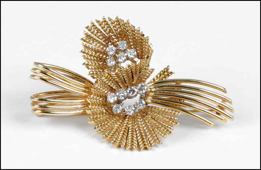 Appraisal: DIAMOND AND KARAT YELLOW GOLD BROOCH round brilliant diamonds total