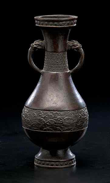 Appraisal: Japanese Bronze Vase Japanese th century a bronze vase with