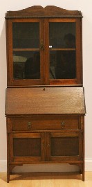 Appraisal: A stained oak secretaire bookcase cm wide cm deep cm