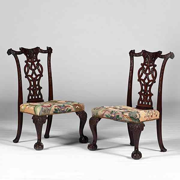 Appraisal: Irish Mahogany Chippendale-style Chairs Irish th century Two elaborately carved