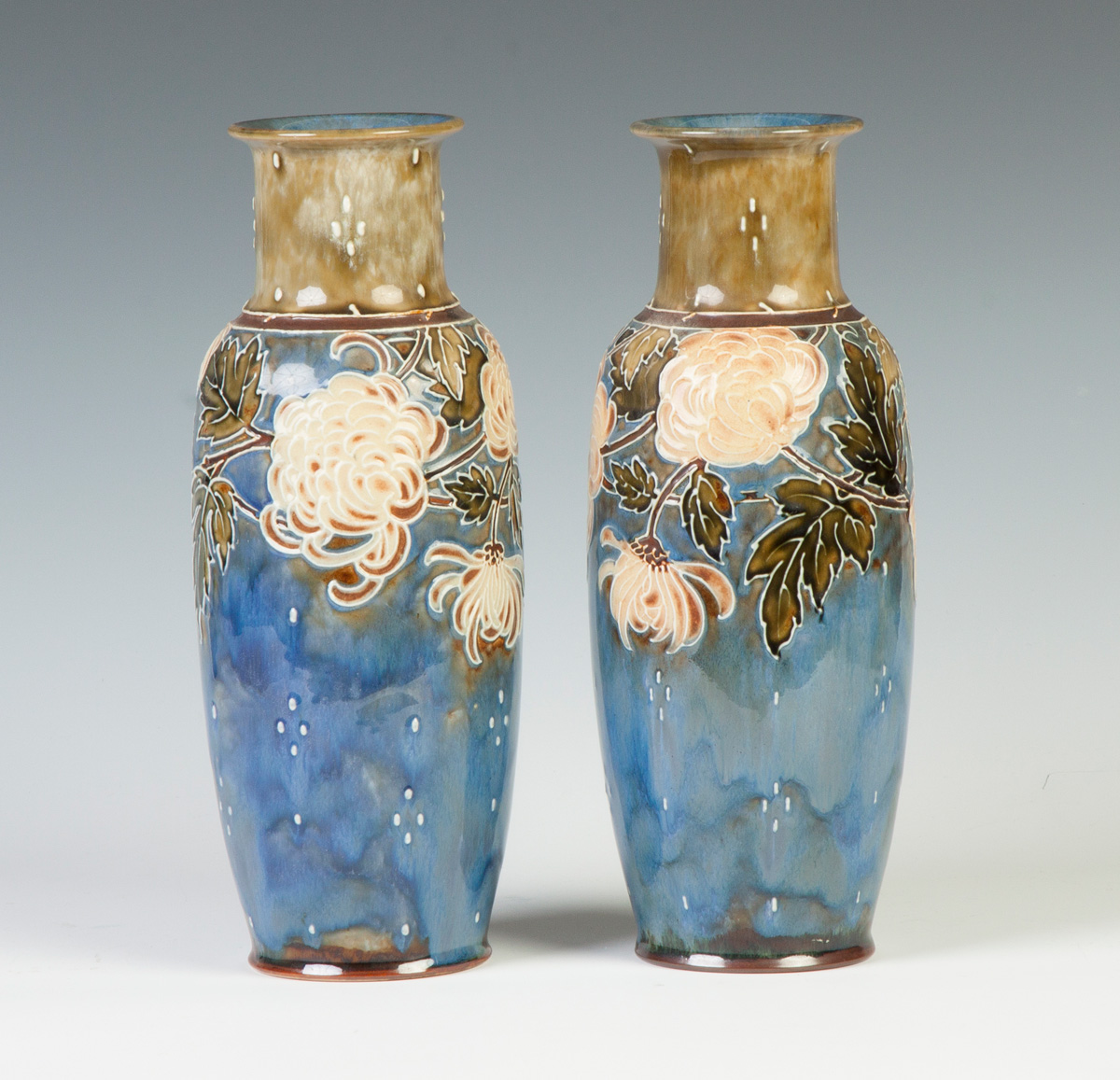 Appraisal: Pair of Hand Painted Royal Doulton Vases Relief floral design