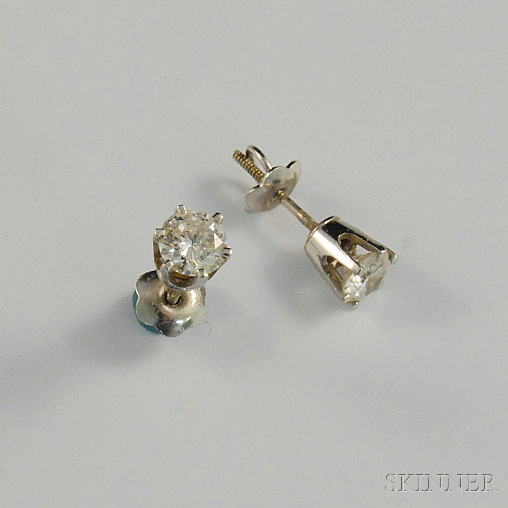 Appraisal: kt White Gold and Diamond Earrings round-cut with screwbacks approx