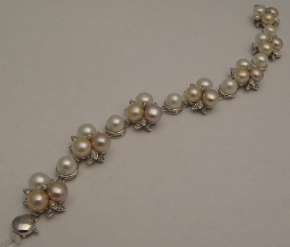 Appraisal: PEARL DIAMOND AND KARAT WHITE GOLD BRACELET - in length