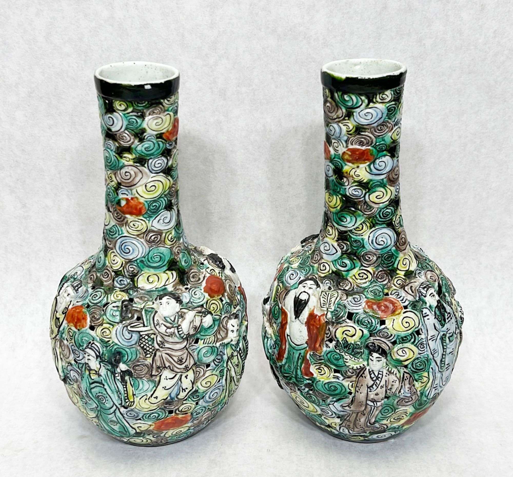 Appraisal: Pair Chinese pierced porcelain vasesImpressed mark to underside of each