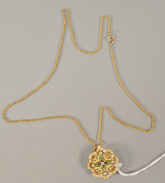 Appraisal: karat gold Enameled pin pendant with five small diamonds on