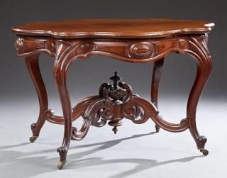 Appraisal: American Rococo Revival Carved Mahogany Turtle Top Center Table c