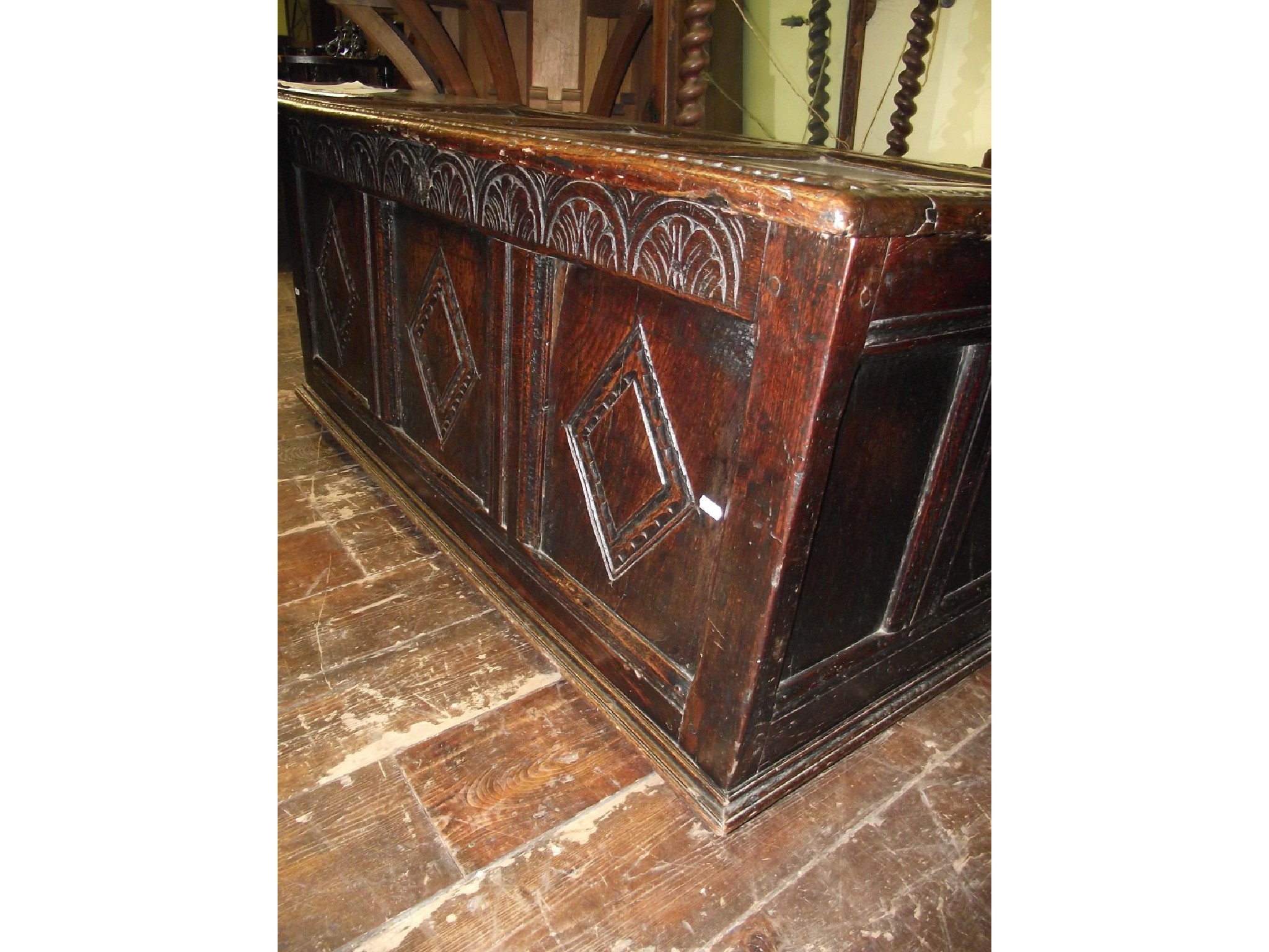 Appraisal: An th century oak coffer the front elevation enclosed by