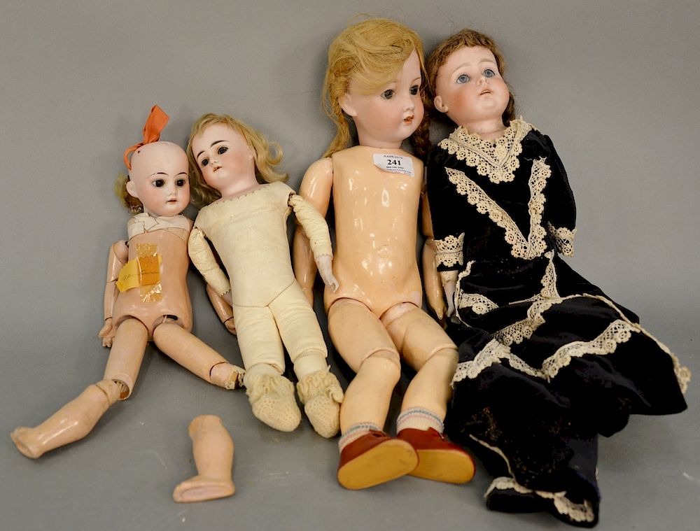 Appraisal: Four bisque head dolls two with kid bodies and two