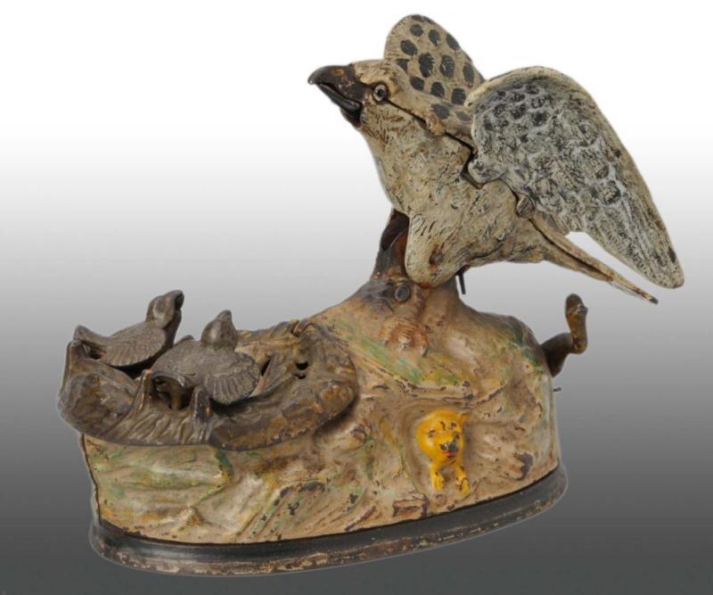 Appraisal: Cast Iron Eagle Eaglets Mechanical Bank Description Manufactured by J