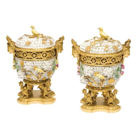 Appraisal: Pair of Louis XVI Style Gilt-Bronze Mounted Porcelain Potpourris Estimate