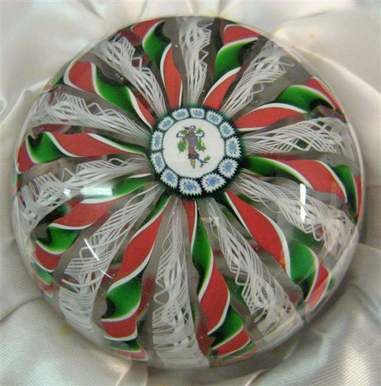 Appraisal: Perthshire glass Christmas paperweight containing ten red green and white