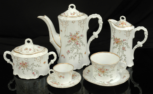 Appraisal: AN ENGLISH COFFEE SERVICE Including demi-tasse large cups and coffee