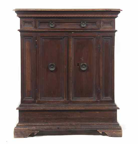 Appraisal: A Continental Walnut Side Cabinet having a rectangular top over