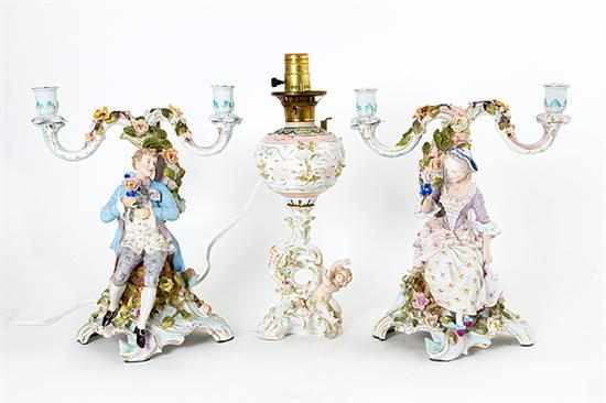 Appraisal: German porcelain figural candelabra and oil lamp late th century