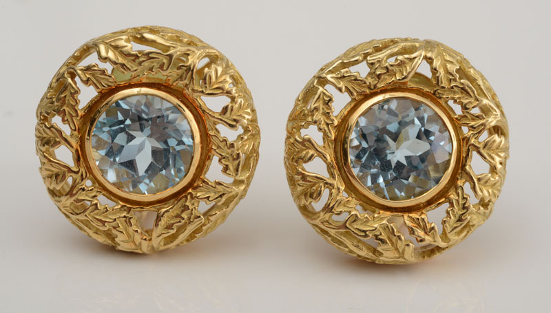 Appraisal: PAIR OF K YELLOW GOLD AND BLUE TOPAZ EARCLIPS Stamped