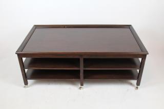 Appraisal: Mahogany -tier cocktail table on casters l x h x