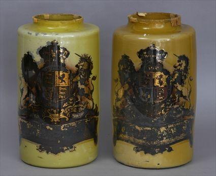 Appraisal: PAIR OF VERRE EGLOMIS CYLINDRICAL JARS Each yellow round bowl