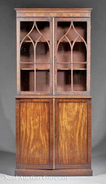 Appraisal: An Antique George III-Style Mahogany Bookcase glazed doors with Gothic