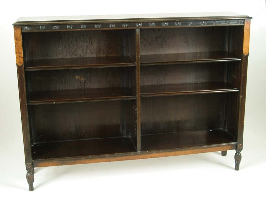 Appraisal: DOUBLE MAHOGANY BOOKCASE Two adjustable shelves to each side decorative