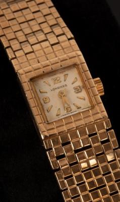 Appraisal: A Longines gold watch with gold bracelet