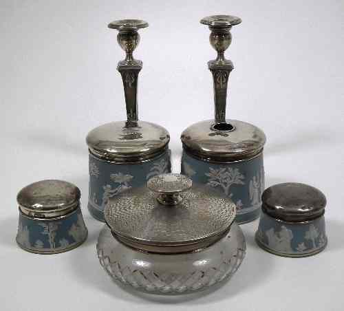 Appraisal: A pair of Edward VII silver square baluster pillar candlesticks