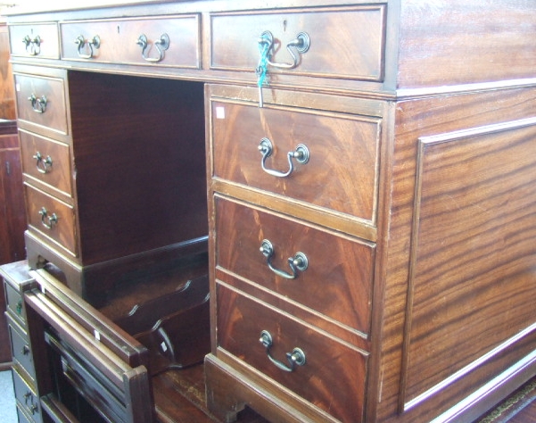 Appraisal: A George III style mahogany pedestal desk the gilt tooled