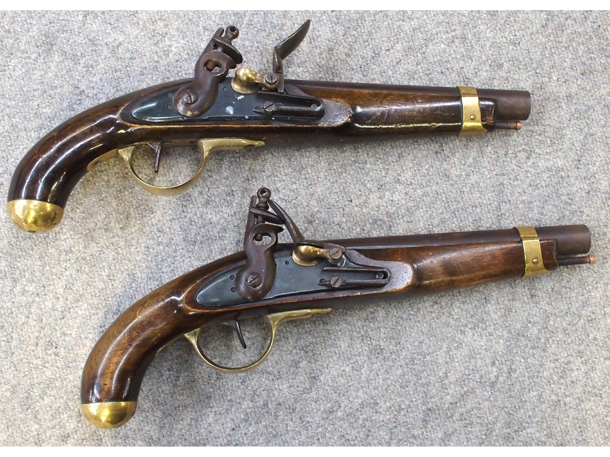 Appraisal: A pair of reproduction Flintlock pistols