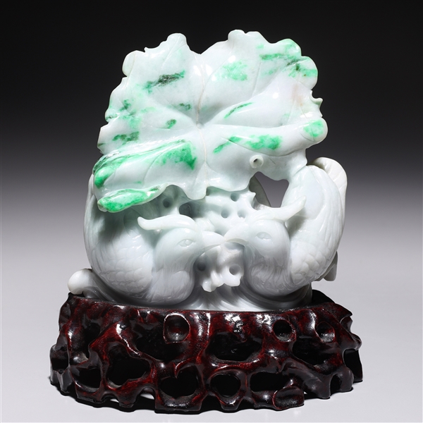 Appraisal: Chinese jadeite bird grouping with two birds and lotus pads