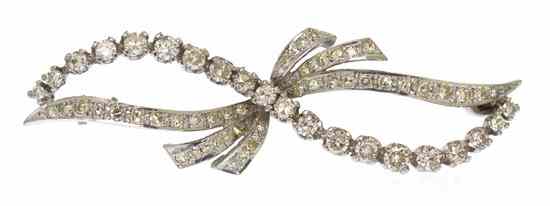 Appraisal: An Karat White Gold and Diamond Brooch containing numerous round