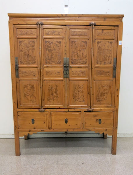 Appraisal: CARVED MING-STYLE YUMU CABINET Chinese th century the front featuring